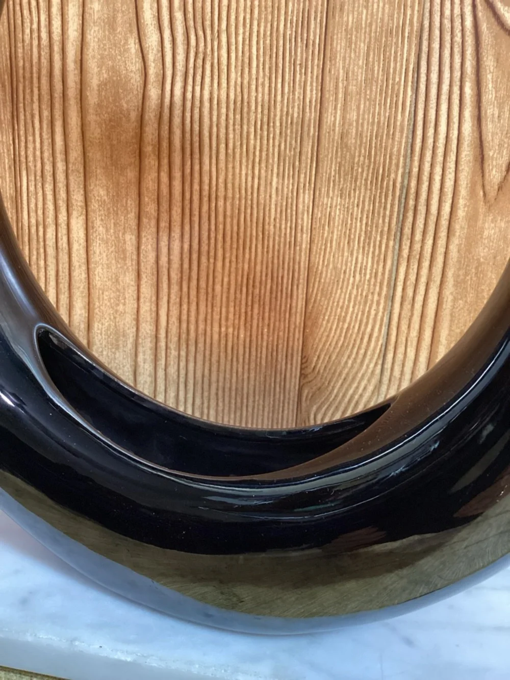 Dolbi Cashier sculptural circular